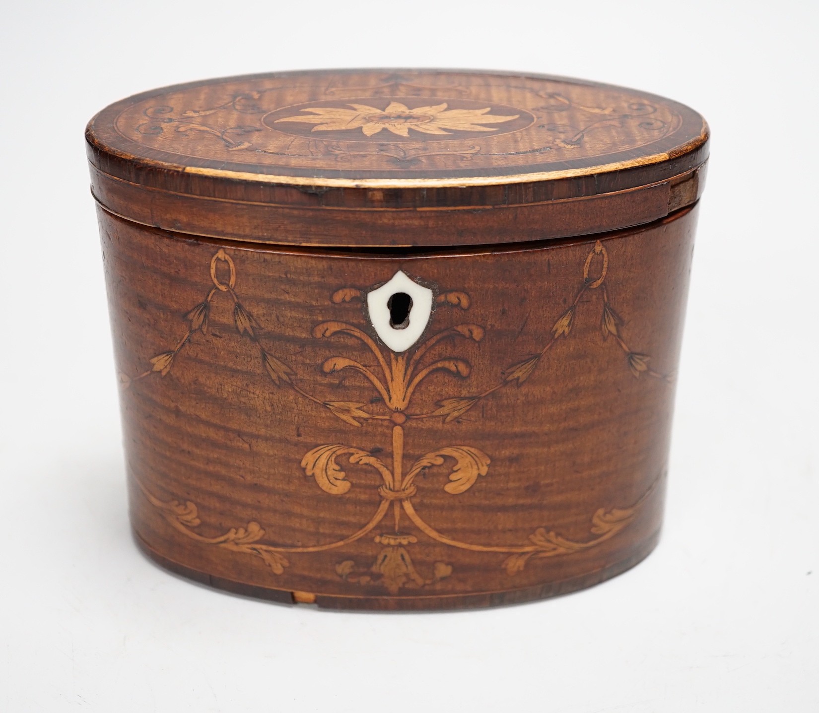 A George III oval harewood and marquetry tea caddy, c.1790, 12cms high x 15cms wide